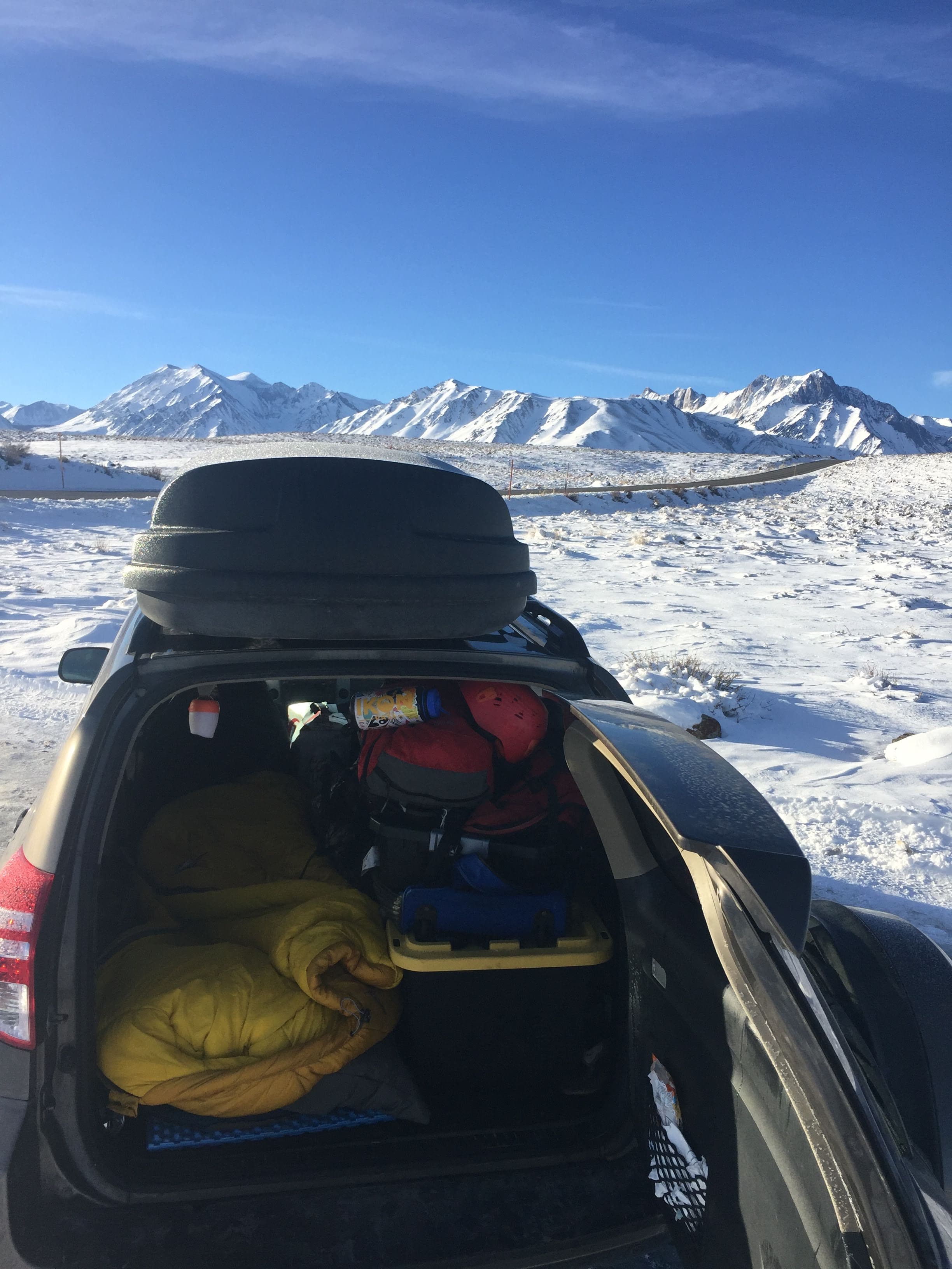 RAV4 camping setup with sleeping platform